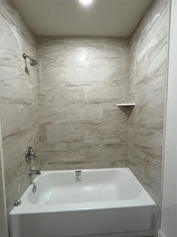a bathroom with a bathtub