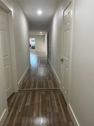 a view of entryway with wooden floor
