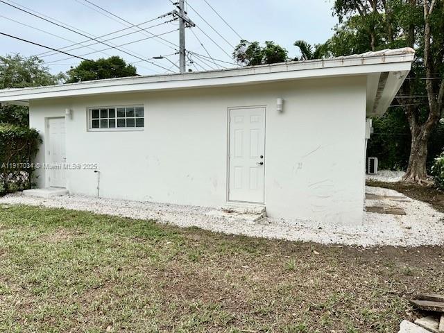 3801 Ponce De Leon, Unit EFFICIENCY Coral Gables, FL 33134 - Photo 13 of 16 a house view with a outdoor space
