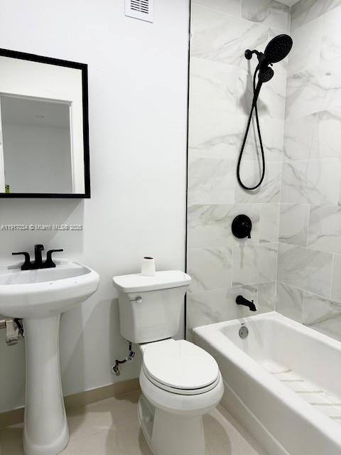 3801 Ponce De Leon, Unit EFFICIENCY Coral Gables, FL 33134 - Photo 8 of 16 a bathroom with a toilet sink and shower