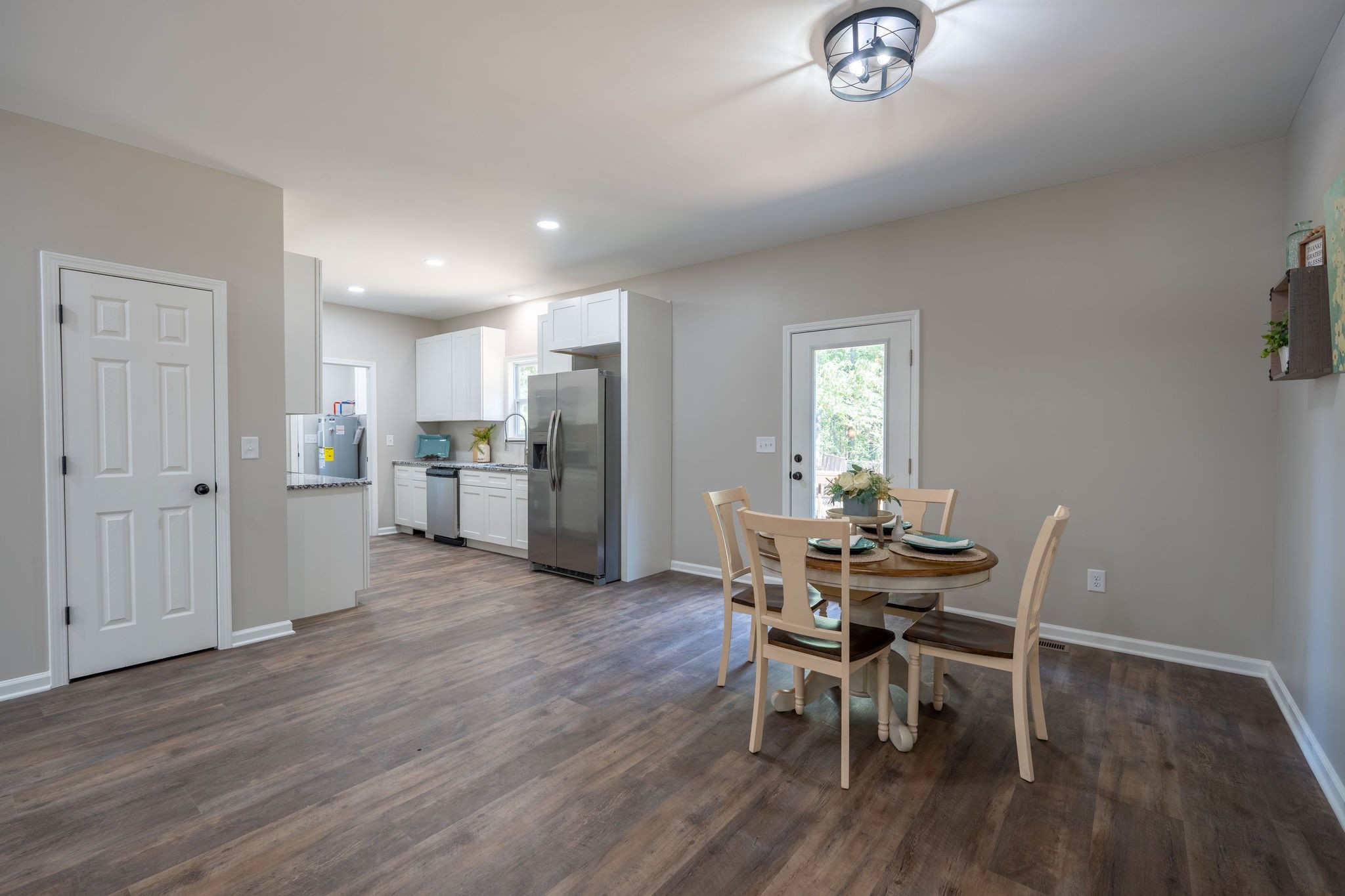 413 Market Street Waynesboro, TN 38485 - Photo 7 of 17 a view of a dining room with furniture and wooden floor