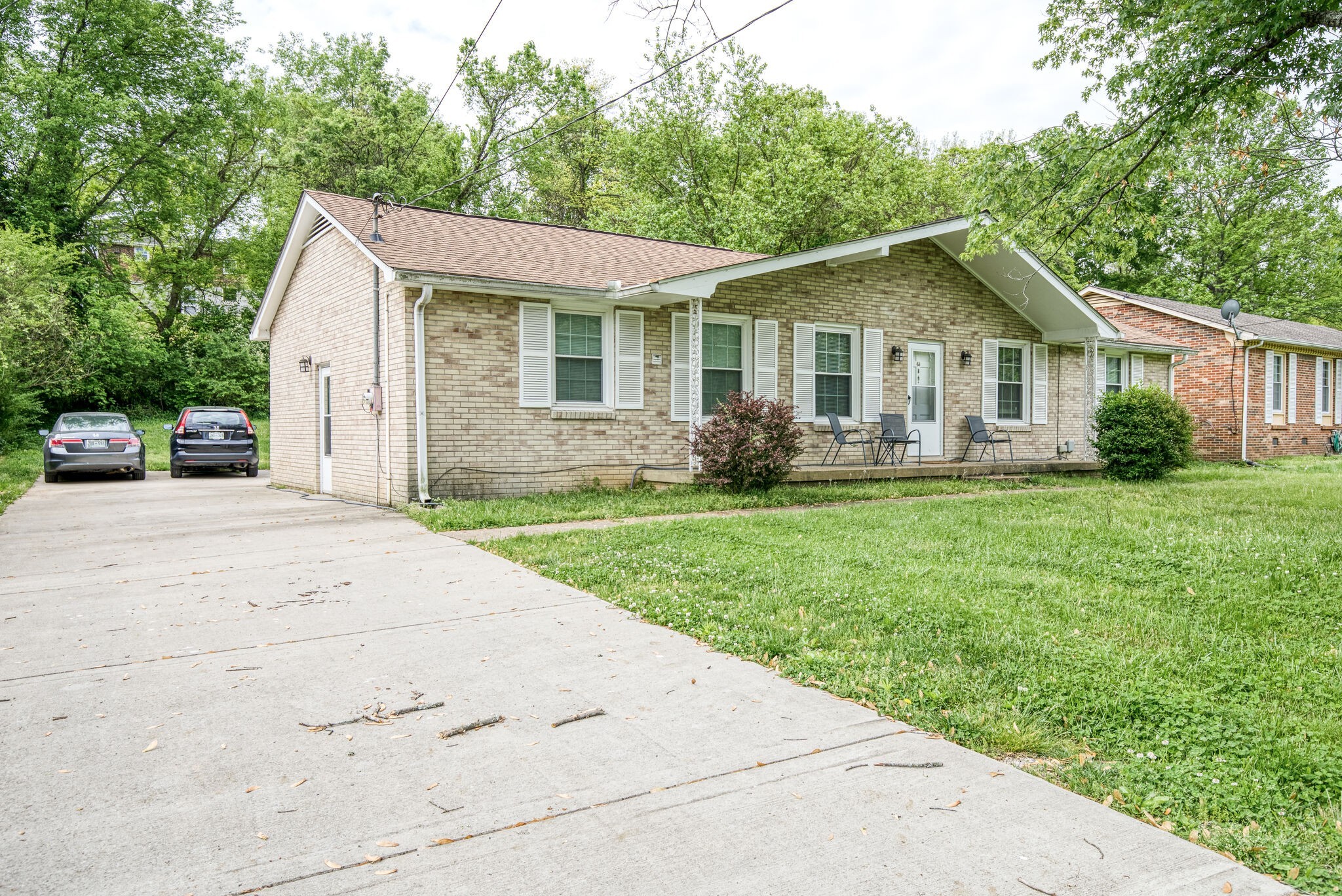 45 Benzing Road Antioch, TN 37013 - Photo 3 of 25 a front view of house with yard and green space