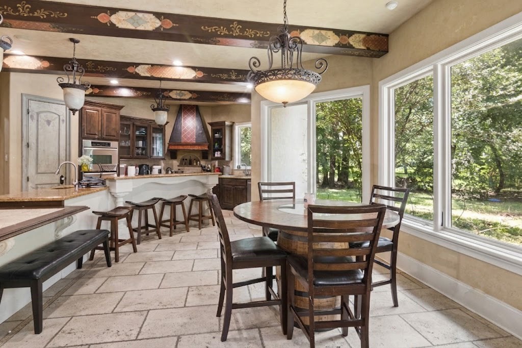 3818 Waterbend Cove Spring, TX 77386 - Photo 8 of 44 a view of a dining room with furniture window and outside view