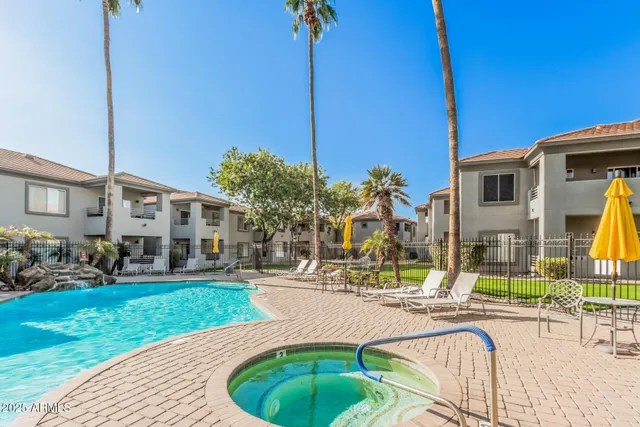 a view of a house with a swimming pool