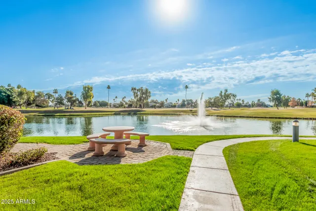 a view of a lake with a big yard