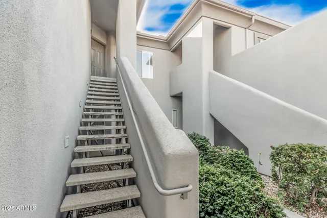 a view of entryway with stairs