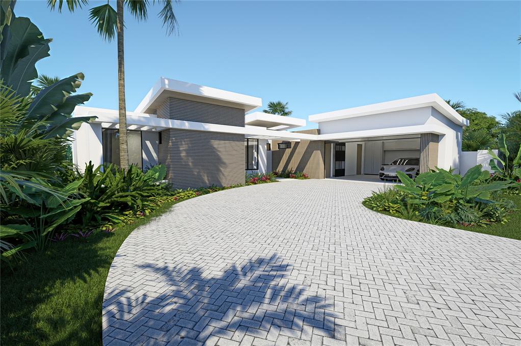19 The Meadows Estates Guaynabo, PR 00971 - Photo 1 of 15 a view of a white house with a yard and potted plants
