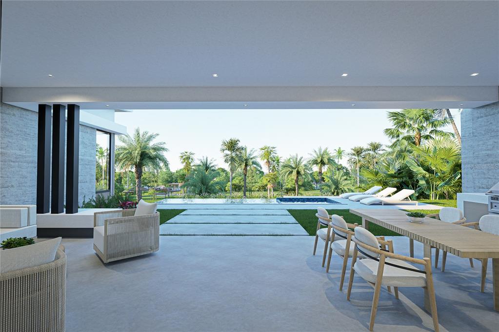 19 The Meadows Estates Guaynabo, PR 00971 - Photo 3 of 15 a view of a patio with a table and chairs and potted plants