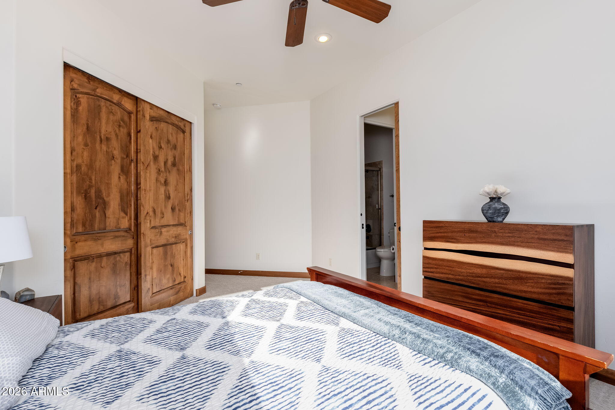 2208 East Filaree Circle Payson, AZ 85541 - Photo 23 of 60 a bedroom with a bed and wooden floor