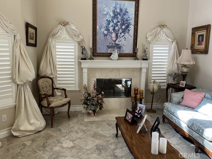 16130 Reiner Circle Riverside, CA 92504 - Photo 13 of 74 a living room with furniture and a fireplace