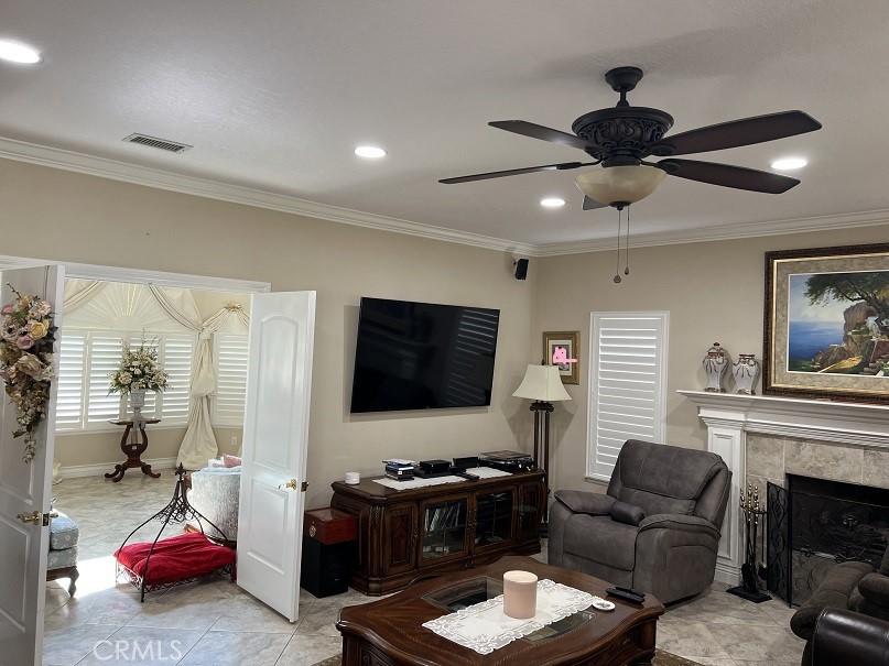 16130 Reiner Circle Riverside, CA 92504 - Photo 20 of 74 a living room with furniture and a flat screen tv
