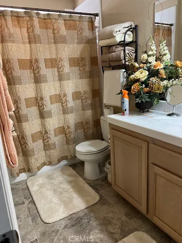 a bathroom with a bathtub and sink