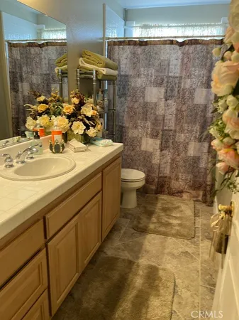 a bathroom with a bathtub and sink