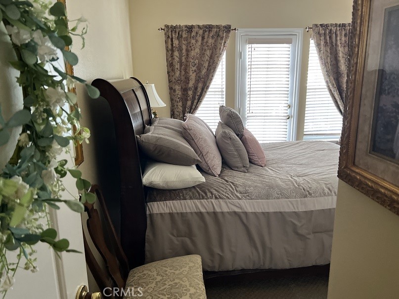16130 Reiner Circle Riverside, CA 92504 - Photo 37 of 74 a bedroom with a bed and window