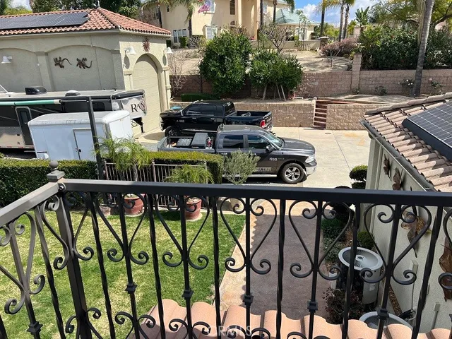 a view of a street with a building in the background