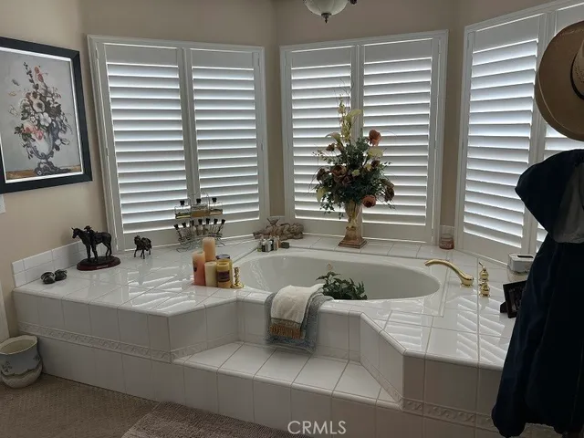 a view of a swimming pool with a yard