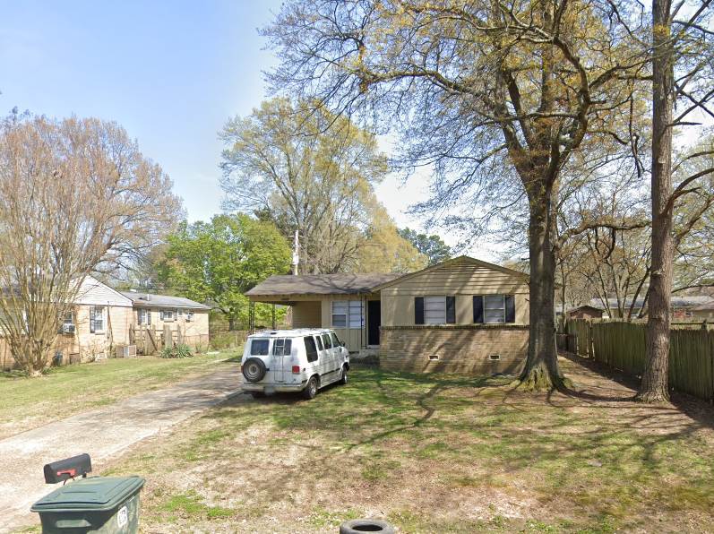 5472 Lochinvar Road Memphis, TN 38116 - Photo 1 of 1 a view of a house with a yard covered in snow