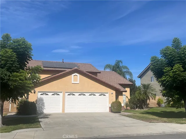 an outdoor view of house with yard