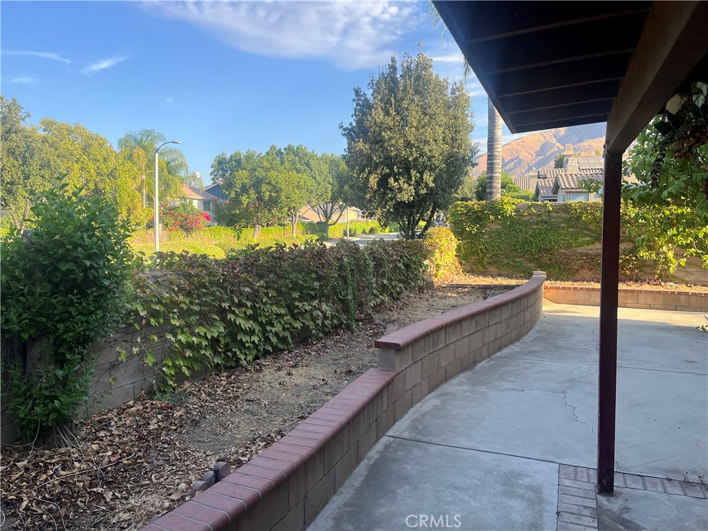 7784 Silver Buckle Road Highland, CA 92346 - Photo 4 of 11 a view of a swimming pool with a patio