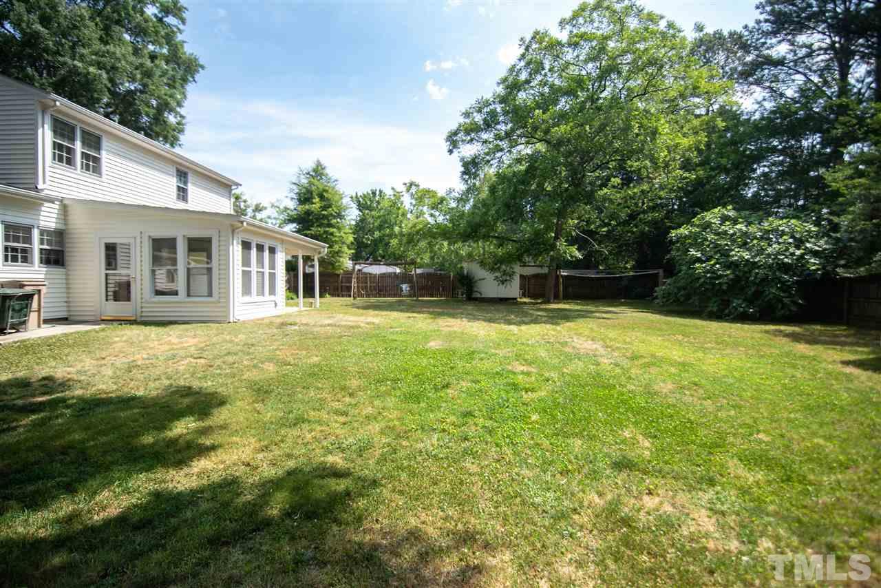1413 Kennon Road Garner, NC 27529 - Photo 22 of 25 Expansive backyard ready for summer barbecues!