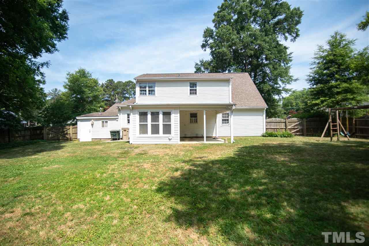 1413 Kennon Road Garner, NC 27529 - Photo 25 of 25 Covered porch creates a charming shelter on sunny or rainy days.
