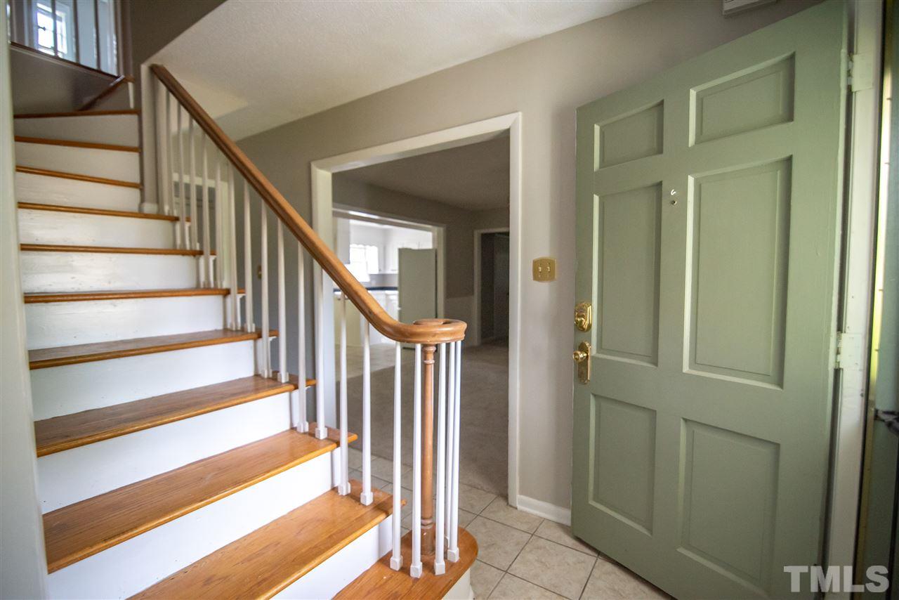 Staircase adds character and charm to the foyer.
