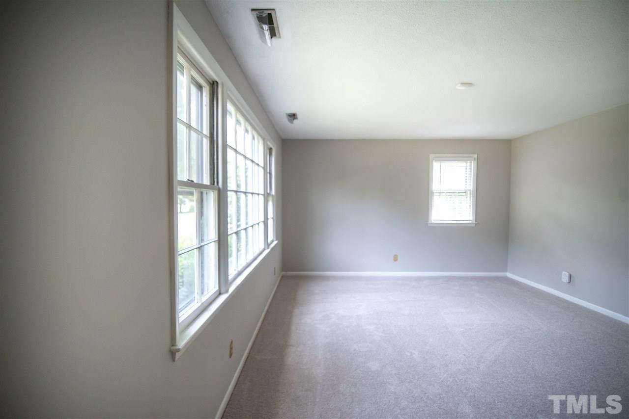 Formal living room offers a welcome place for guest and family to linger.
