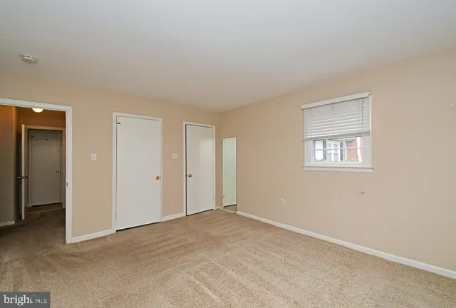 a backyard of a house with seating space