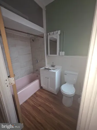 a bathroom with a sink and a bathtub