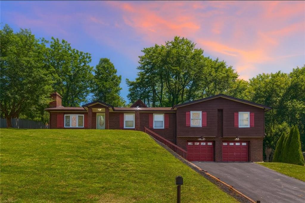 a view of a house with a swimming pool