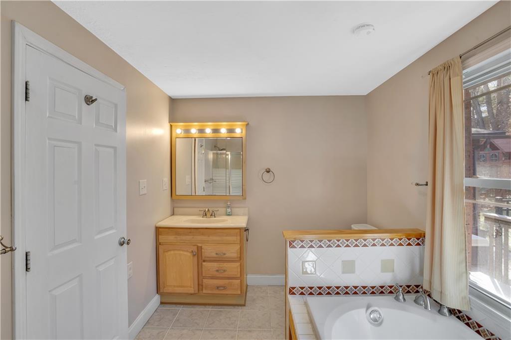 143 Northview Circle Beaver, PA 15009 - Photo 18 of 41 a bathroom with a sink a toilet and shower