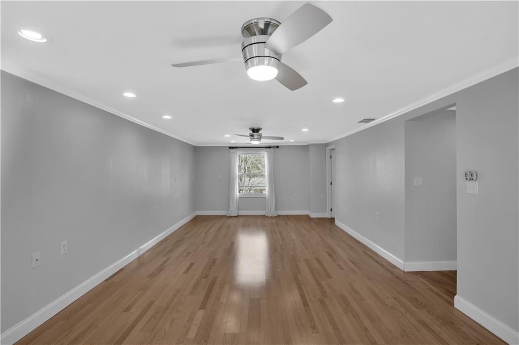 143 Northview Circle Beaver, PA 15009 - Photo 25 of 41 an empty room with wooden floor and windows