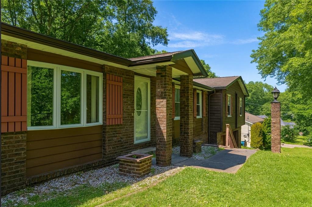 143 Northview Circle Beaver, PA 15009 - Photo 3 of 41 a backyard of a house with seating space