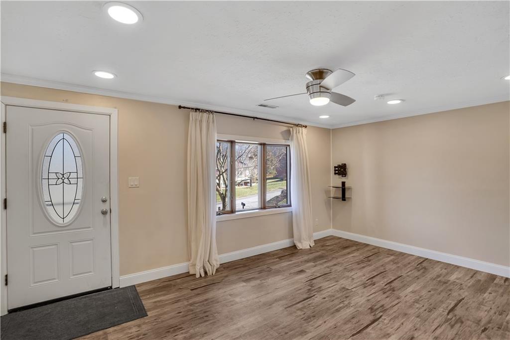 143 Northview Circle Beaver, PA 15009 - Photo 6 of 41 wooden floor in an empty room with a window