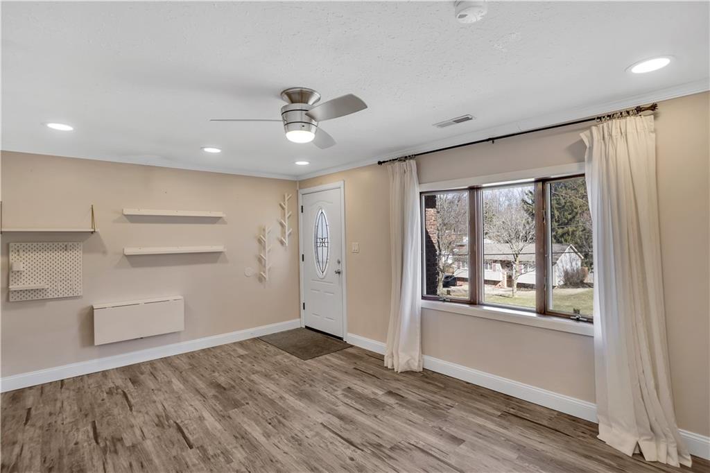 143 Northview Circle Beaver, PA 15009 - Photo 7 of 41 a view of empty room with wooden floor and windows