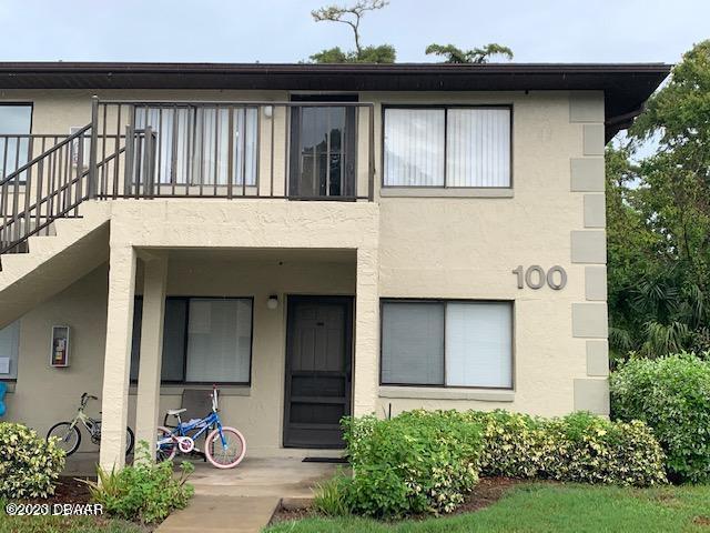 1601 Big Tree Road, Unit 108 Daytona Beach, FL 32119 - Photo 1 of 17 a front view of a house