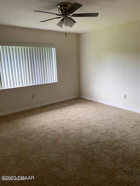 1601 Big Tree Road, Unit 108 Daytona Beach, FL 32119 - Photo 15 of 17 an empty room with a window