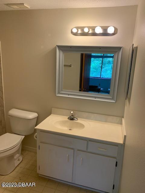 1601 Big Tree Road, Unit 108 Daytona Beach, FL 32119 - Photo 9 of 17 a bathroom with a sink and a toilet