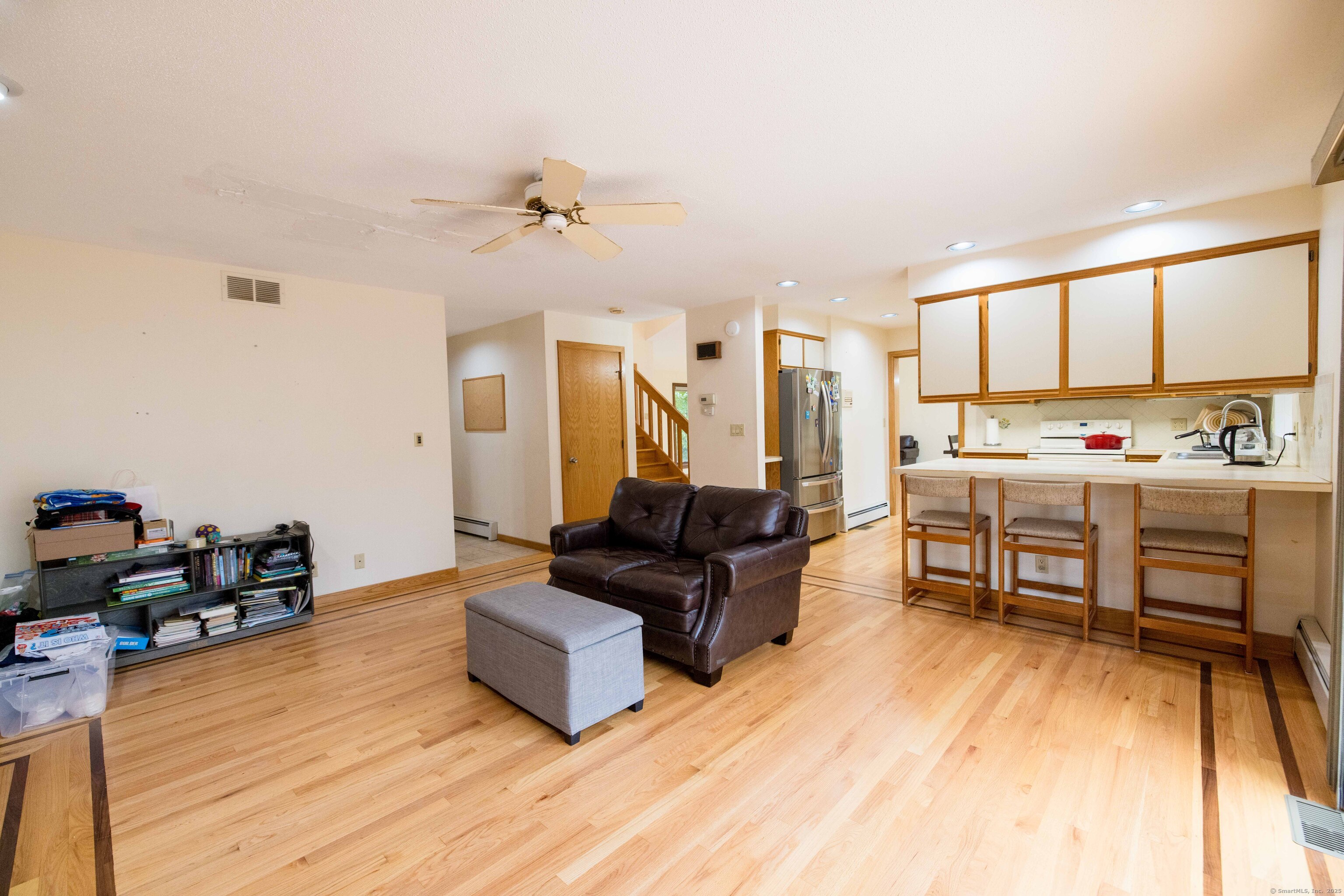 18 Clifford Avenue Tolland, CT 06084 - Photo 13 of 40 a living room with furniture and wooden floor