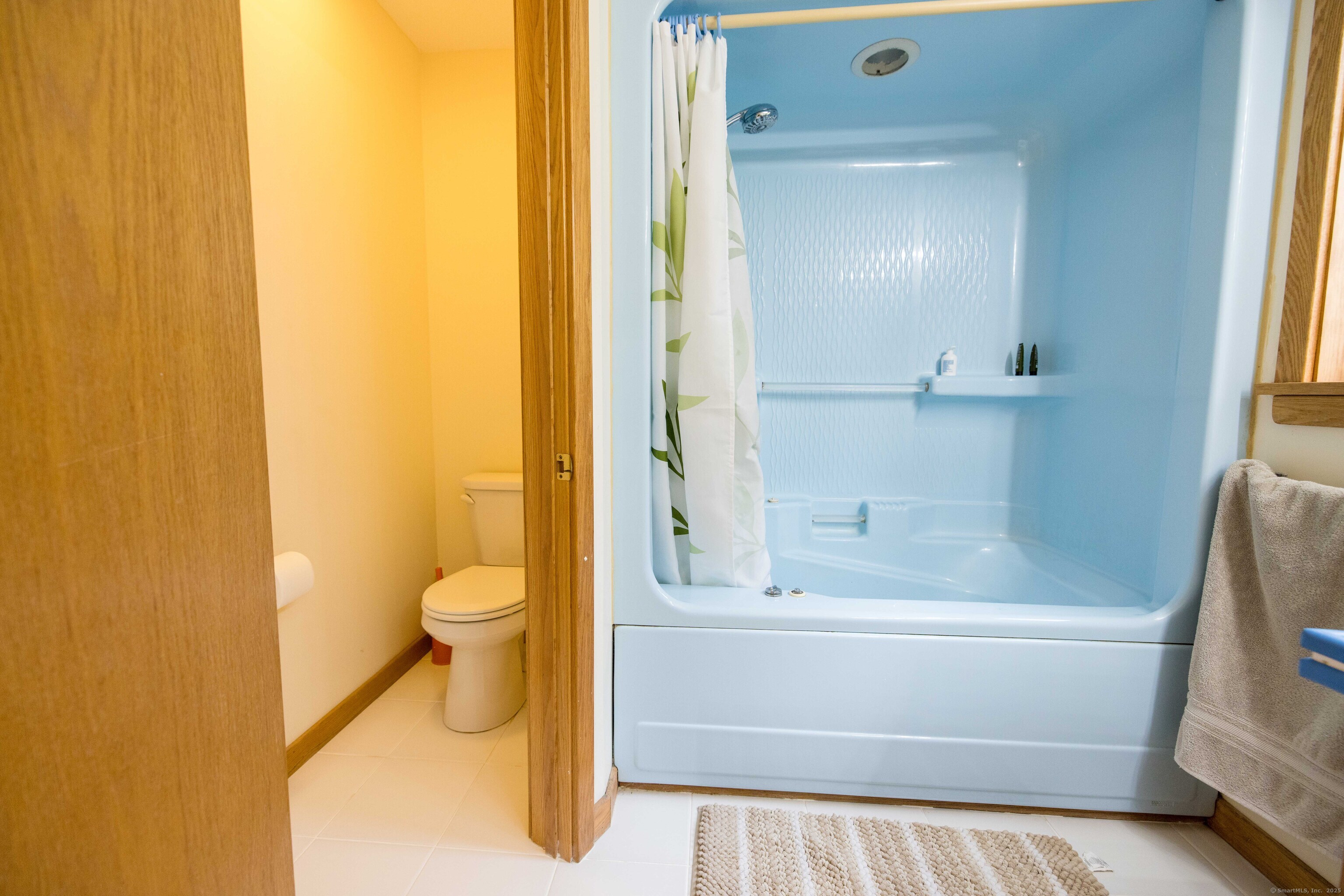 18 Clifford Avenue Tolland, CT 06084 - Photo 20 of 40 a bathroom with a toilet and a shower