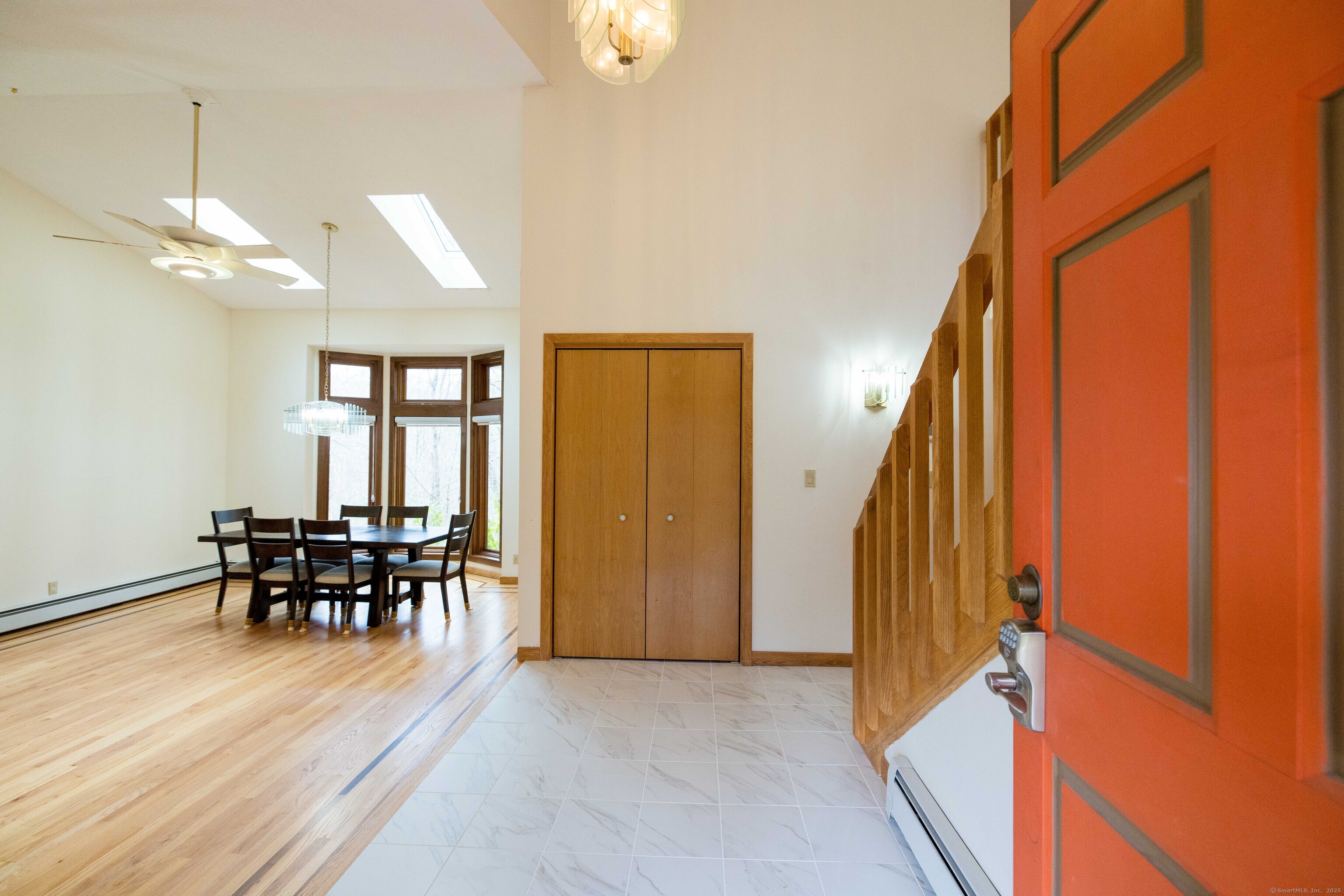 18 Clifford Avenue Tolland, CT 06084 - Photo 2 of 40 an open kitchen with dining table and chairs