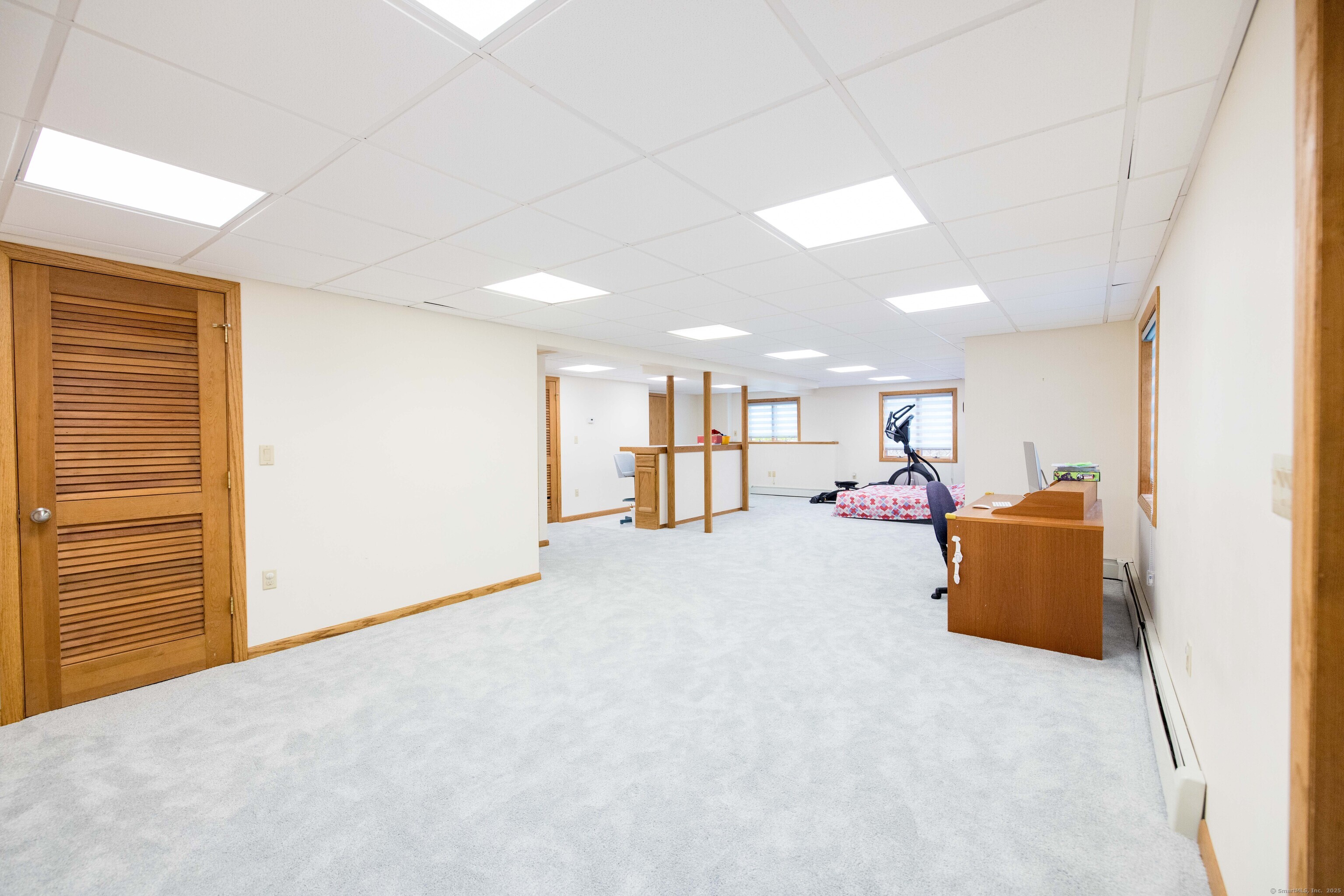 18 Clifford Avenue Tolland, CT 06084 - Photo 28 of 40 a bed room with furniture and a window