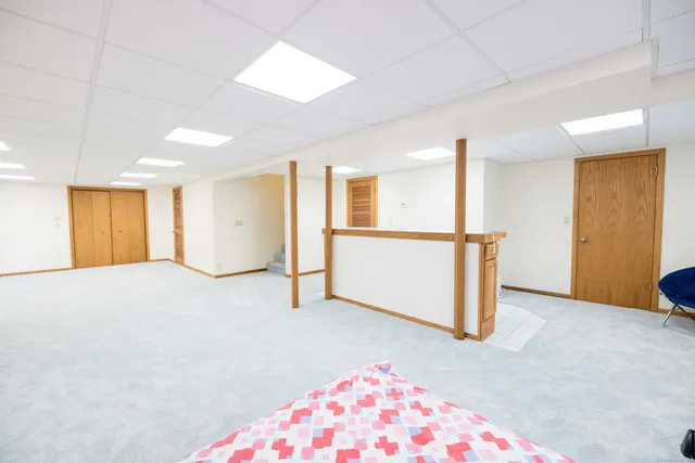 a view of livingroom with hardwood floor and cabinet
