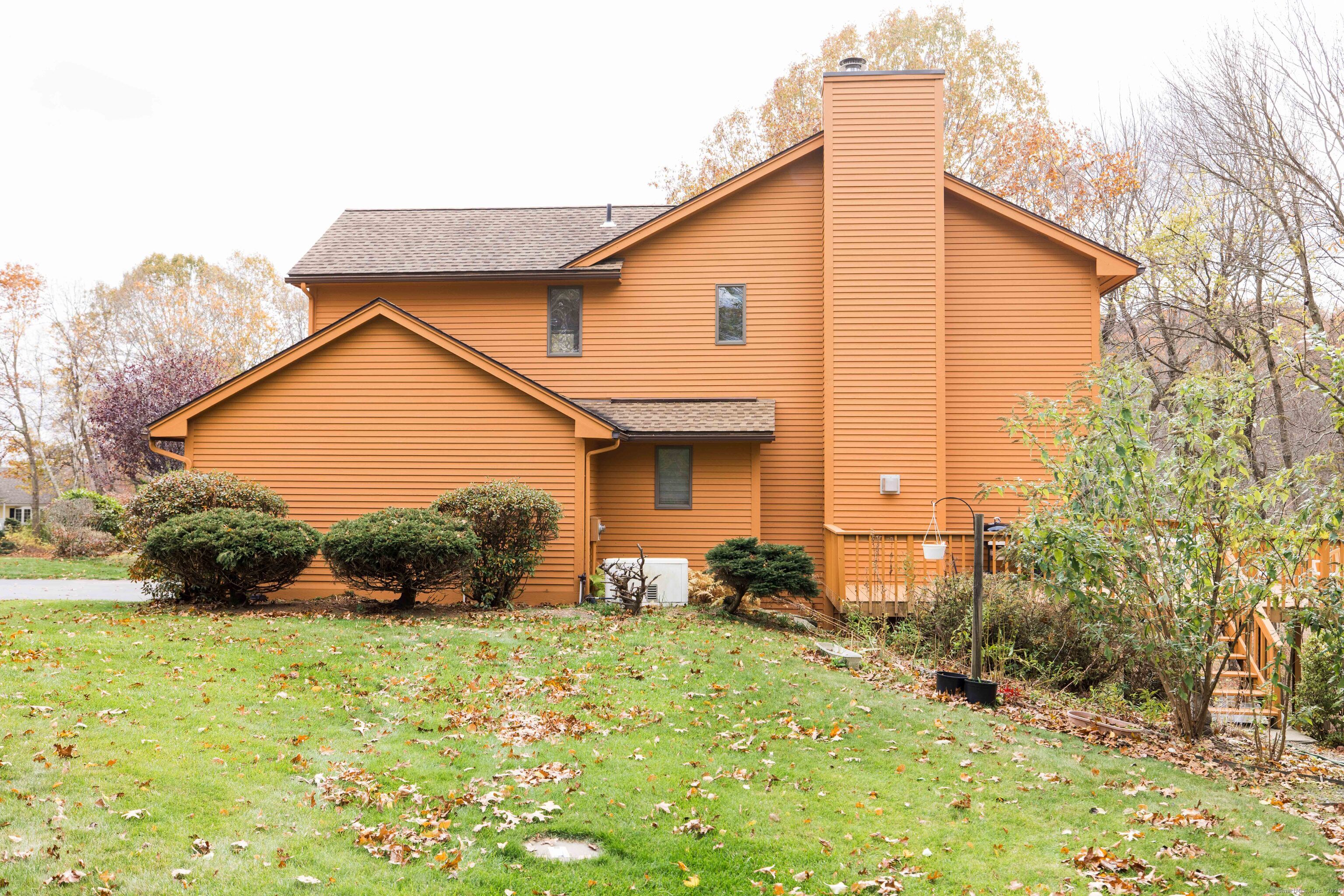 18 Clifford Avenue Tolland, CT 06084 - Photo 35 of 40 a front view of a house with garden