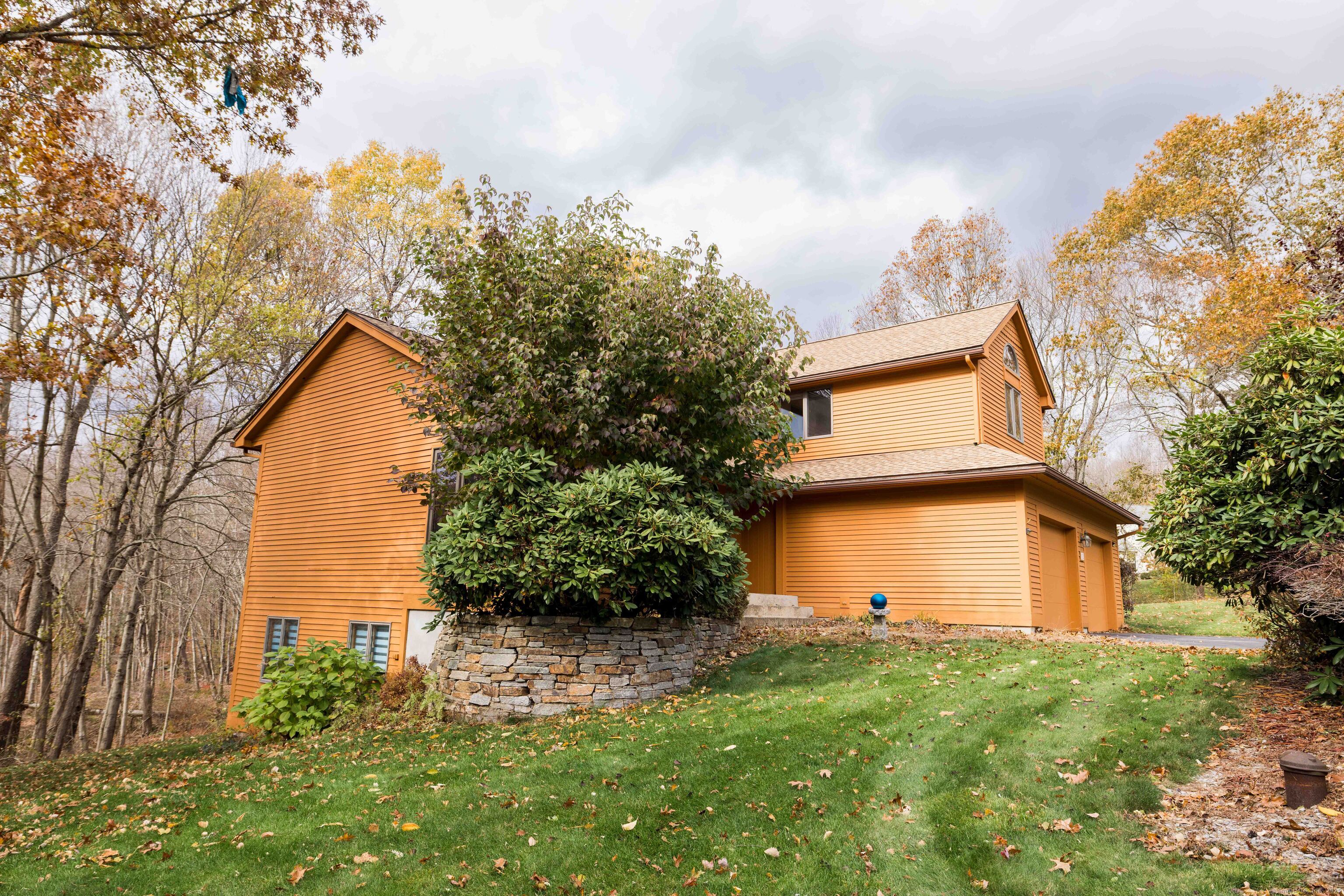 18 Clifford Avenue Tolland, CT 06084 - Photo 36 of 40 a view of a house with a backyard