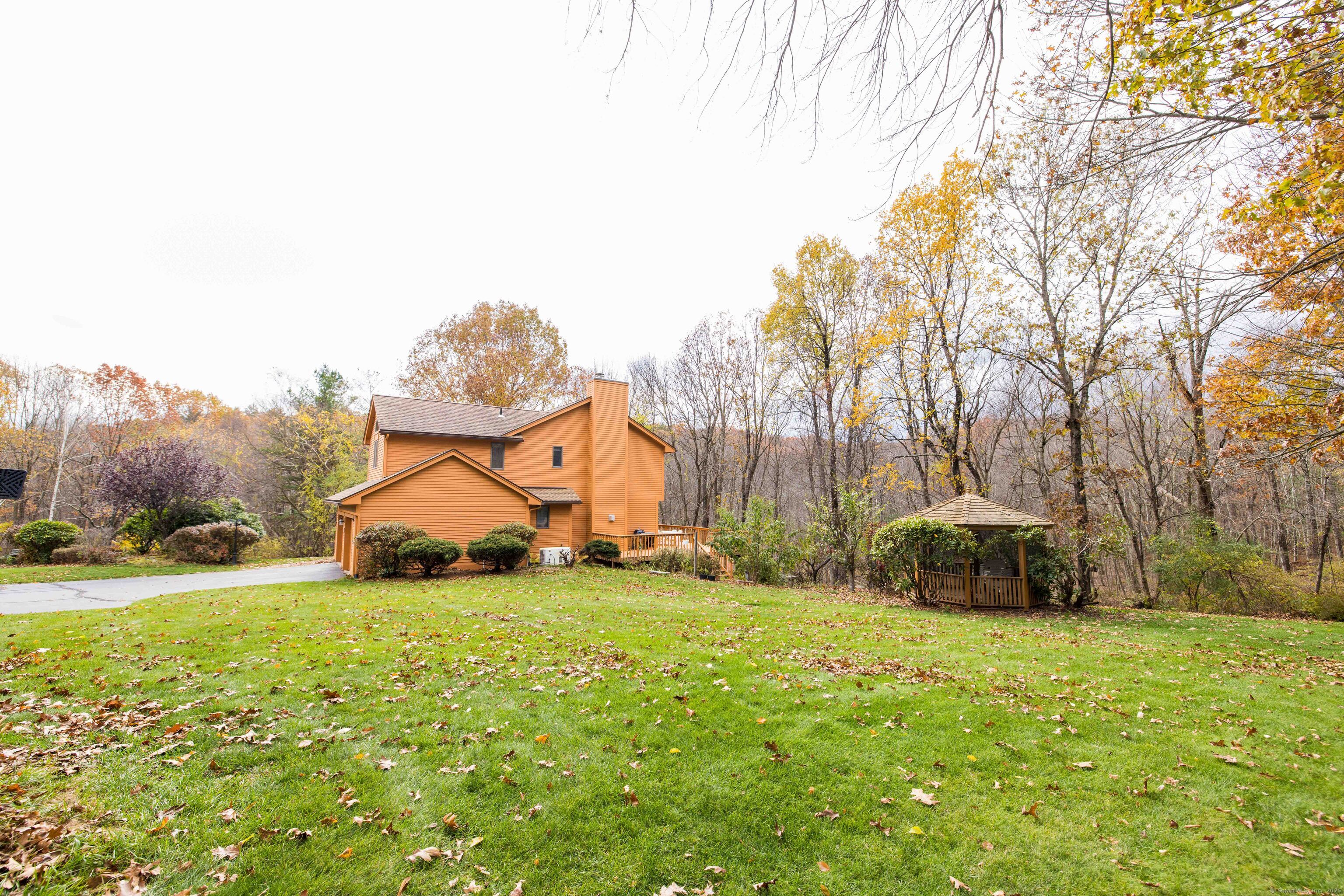 18 Clifford Avenue Tolland, CT 06084 - Photo 38 of 40 a view of a house with a yard