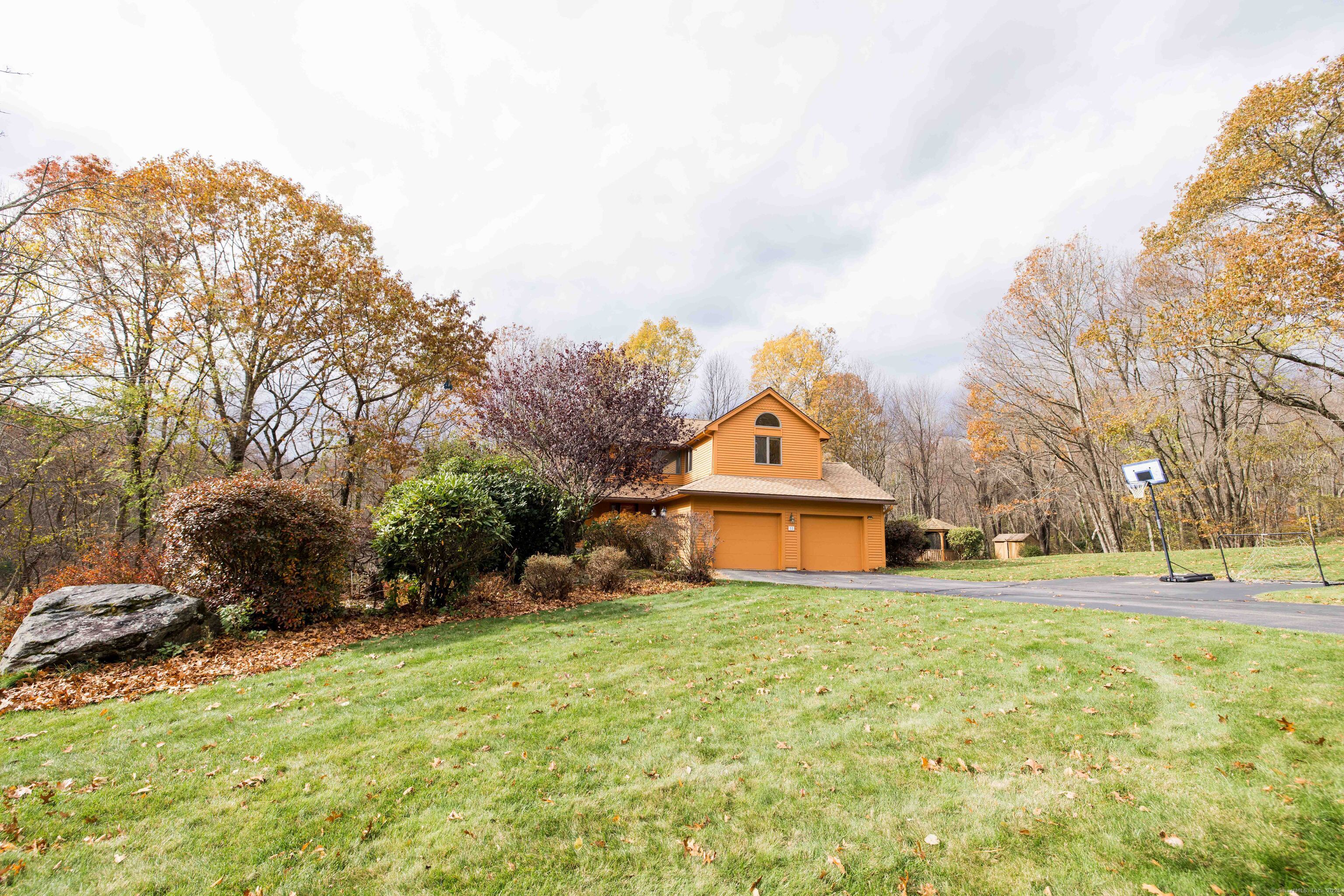 18 Clifford Avenue Tolland, CT 06084 - Photo 39 of 40 a view of a house with a yard