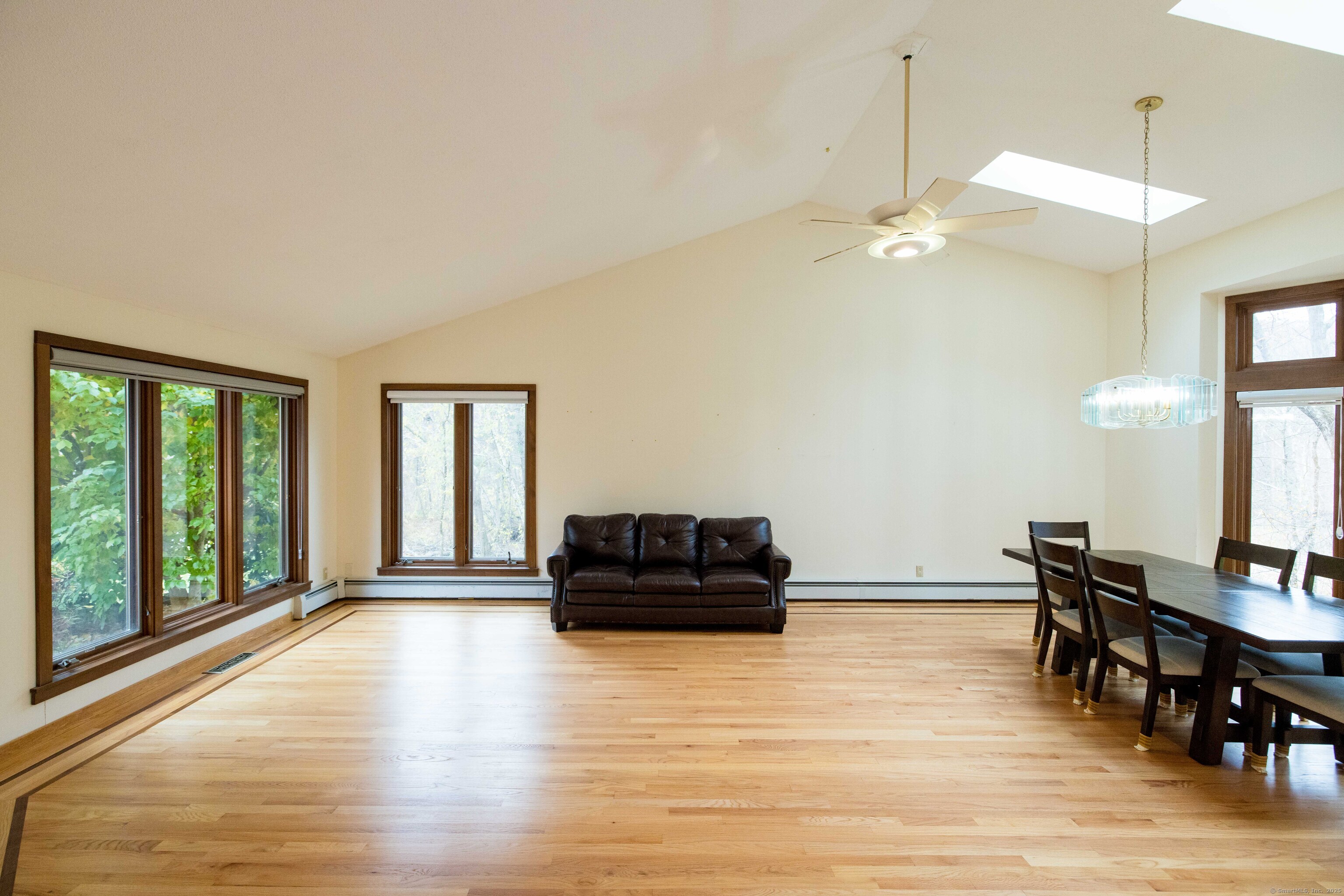 18 Clifford Avenue Tolland, CT 06084 - Photo 4 of 40 a living room with furniture and wooden floor