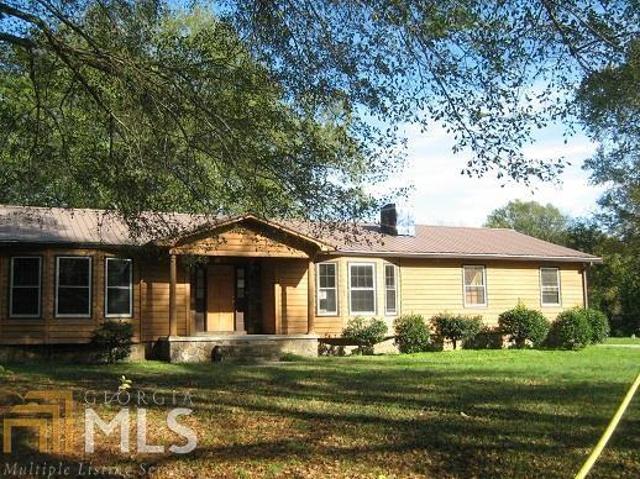 6 Betty Kay Avenue Rome, GA 30165 - Photo 1 of 1 a front view of a house with a garden