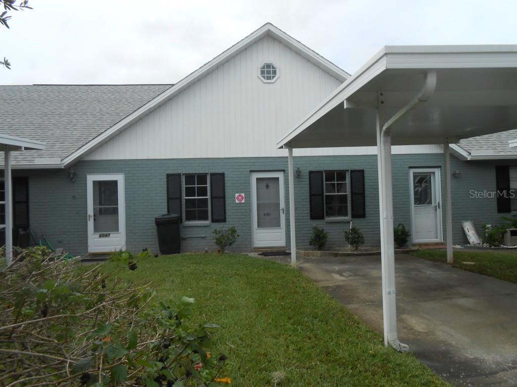 FRONT OF THE PROPERTY, THIS IS A CENTER UNIT. ONE CAR CARPORT.